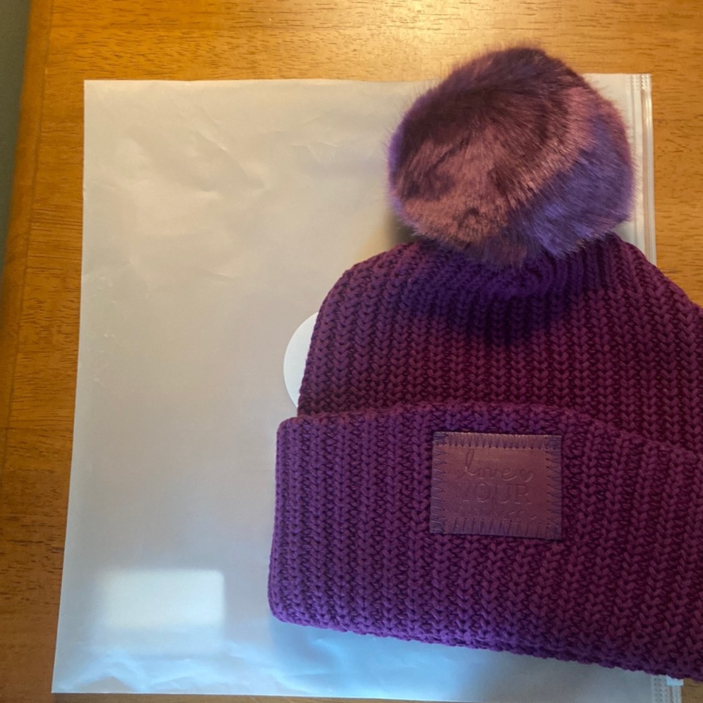 Brand new. Love your melon mulberry Monochrome Pom Beanie